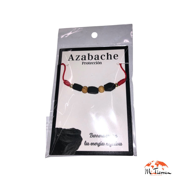 Pulsera roja con 3 azabaches y dos palosanto