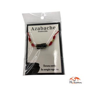 Pulsera roja con azabache y dorado