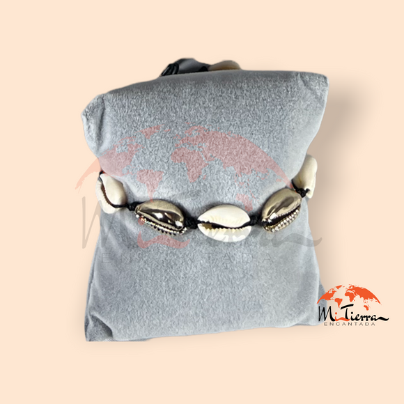 Pulsera de protección Caracola dorada